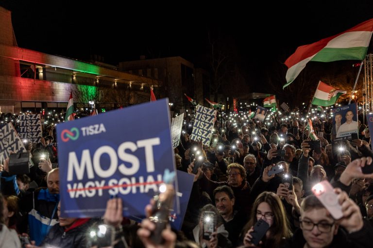 19 March 2026 Siófok, Hungary. At an election rally for Péter Magyar, leader of the TISZA party. In the foreground is a sign bearing the slogan “Now or never!”.