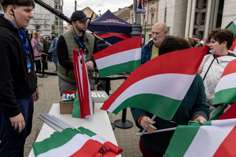 21 March 2026 Miskolc, Hungary. FIDESZ election rally. Around the venues where the meeting with Viktor Orbán is to take place, there are stands where Hungarian flags are being handed out to everyone.