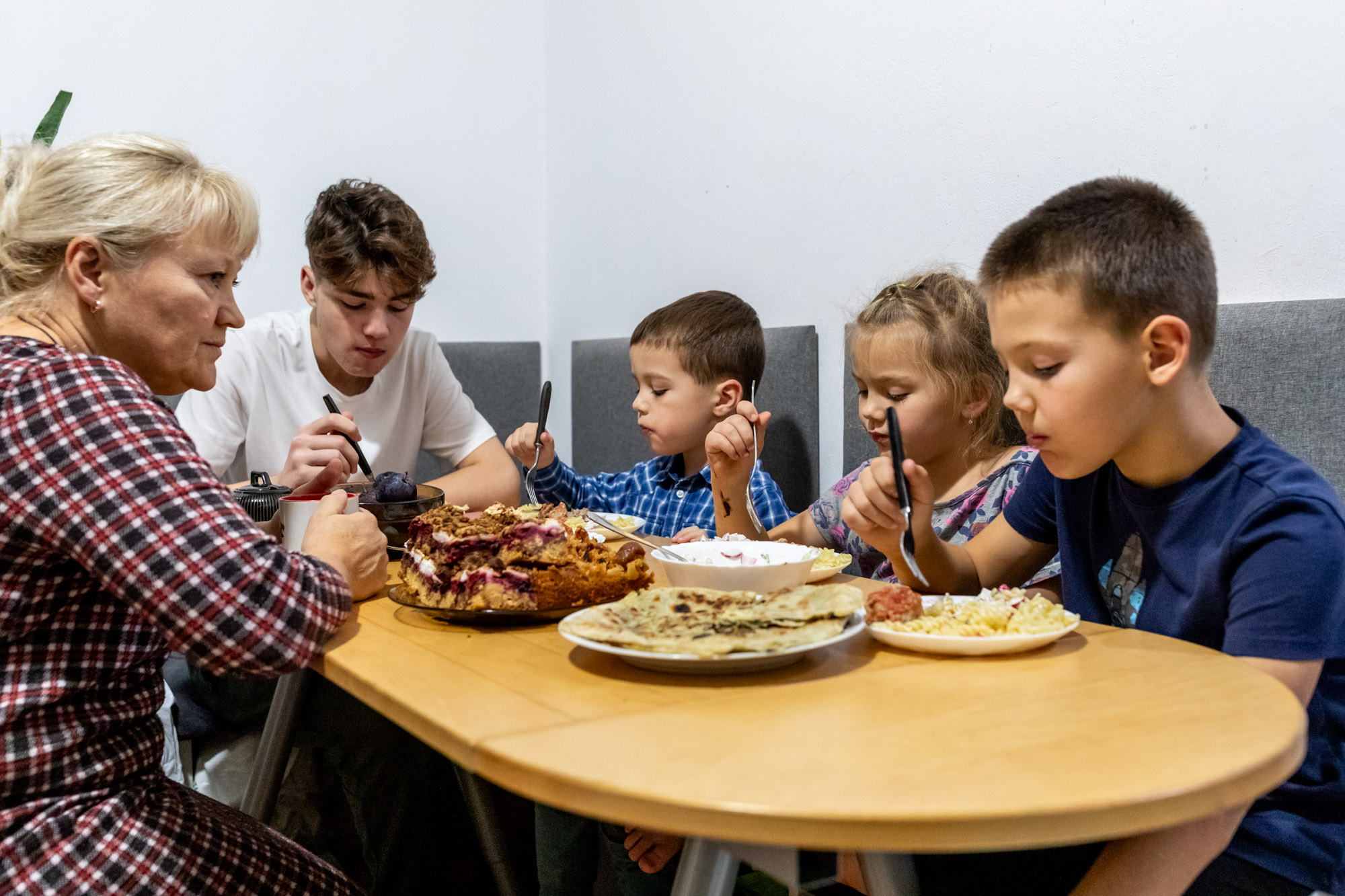 Anna Kanavalava and the children she looks after