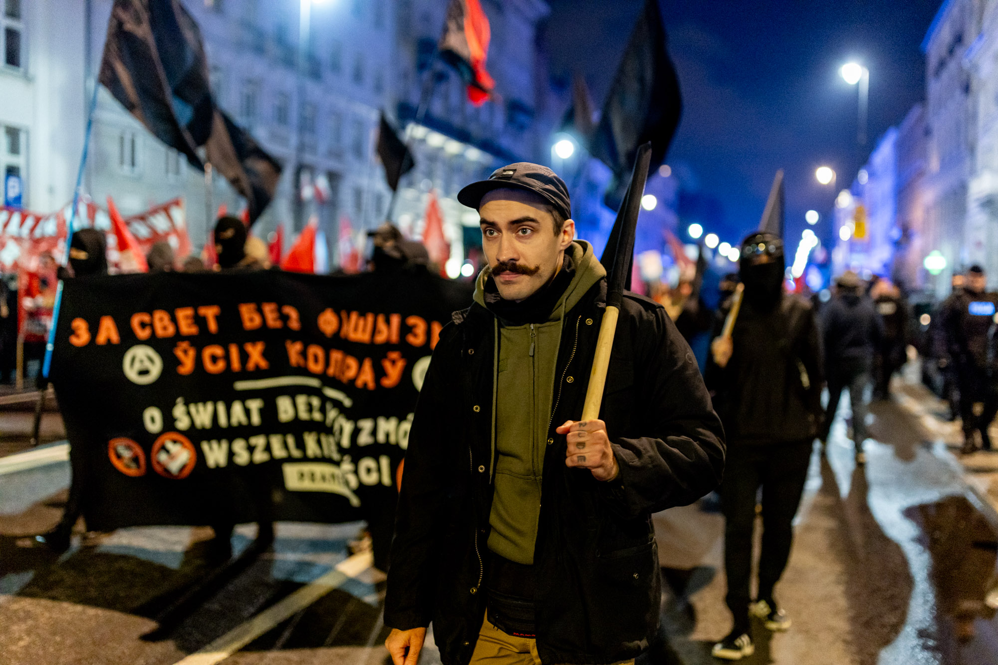 Yauheni Zhurauski taking part in a demonstration on the streets of Warsaw